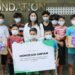 A Symbolic Aids Handover Photo by Kredit Pintar
