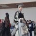 A model wears modest clothing made from Indonesian wastra at the kickoff of IN2MF 2023 in Jakarta (10/13).
