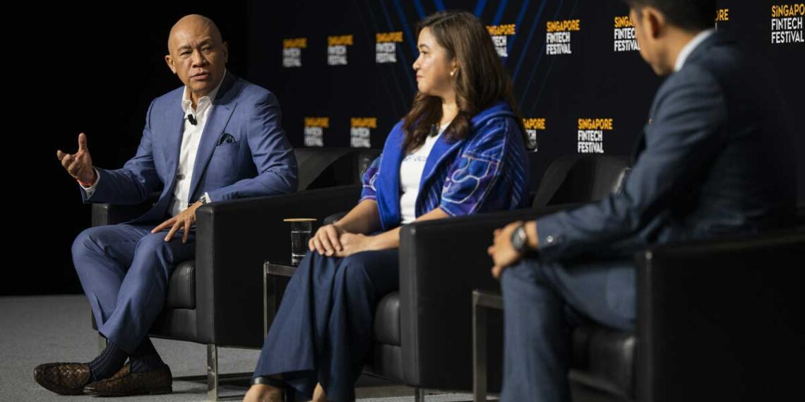 Ernest Cu, Globe Group President and CEO, speaks about raising unicorns in a panel discussion at the Singapore Fintech Festival, November 15, 2023. Beside him is Martha Sazon, President and CEO of Globe affiliate GCash, the country’s No. 1 Finance App and only double unicorn. (Photo via SFF)
