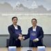 Jeff You and Fang Weimin sign a strategic cooperation agreement, representing EXENCELL and TÜV Rheinland respectively.