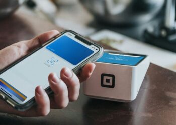 Illustration of mobile banking payment system. Credit: Nathan Dumlao/Unsplash