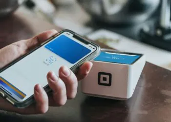 Illustration of mobile banking payment system. Credit: Nathan Dumlao/Unsplash