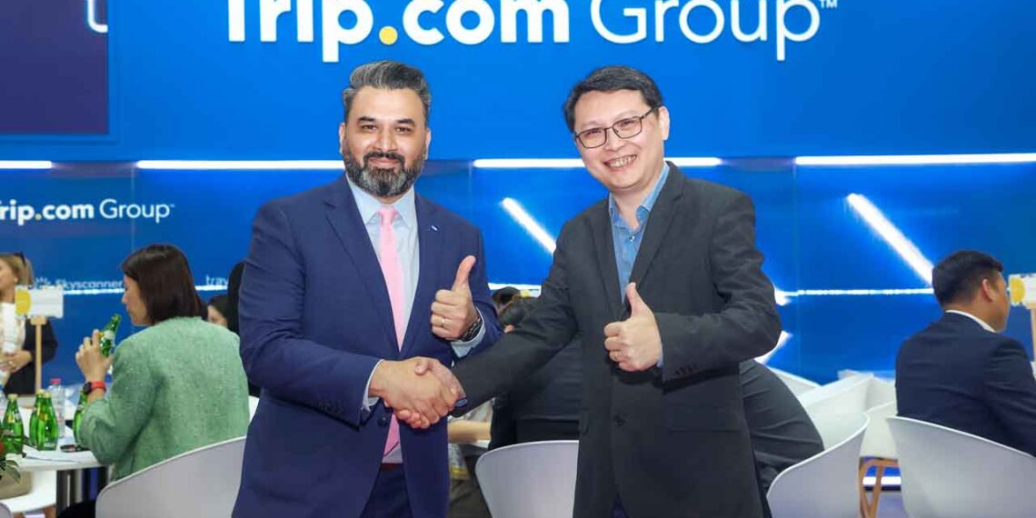 Siddharth Sudhakar and Boon Sian Chai at the Trip.com Group booth at ATM.