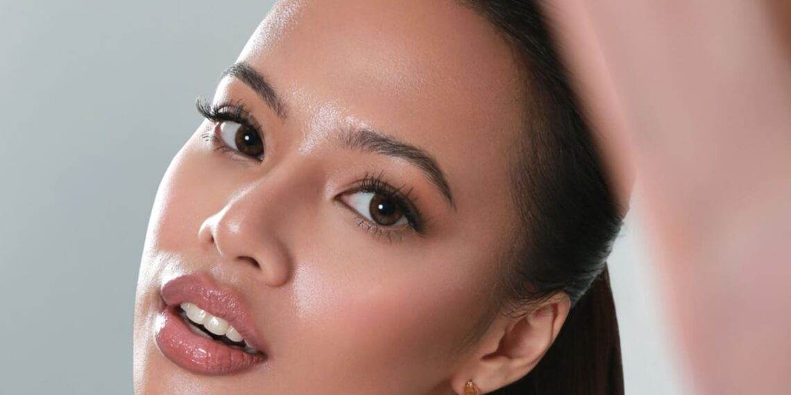 A model using Hue contact lenses in espresso brown. Credit: Hue