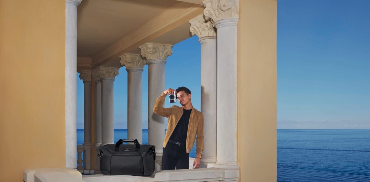 Lando Norris stars in an exciting campaign alongside the Turin collection and other iconic Tumi lines, including the Alpha X, 19 Degree Titanium, and Tumi | McLaren. Credit: Tumi