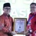 Minister of Administrative and Bureaucratic Reform (PANRB) Abdullah Azwar Anas presented the SAKIP Award 2024 for govt performance accountability. Credit: Ministry of PANRB
