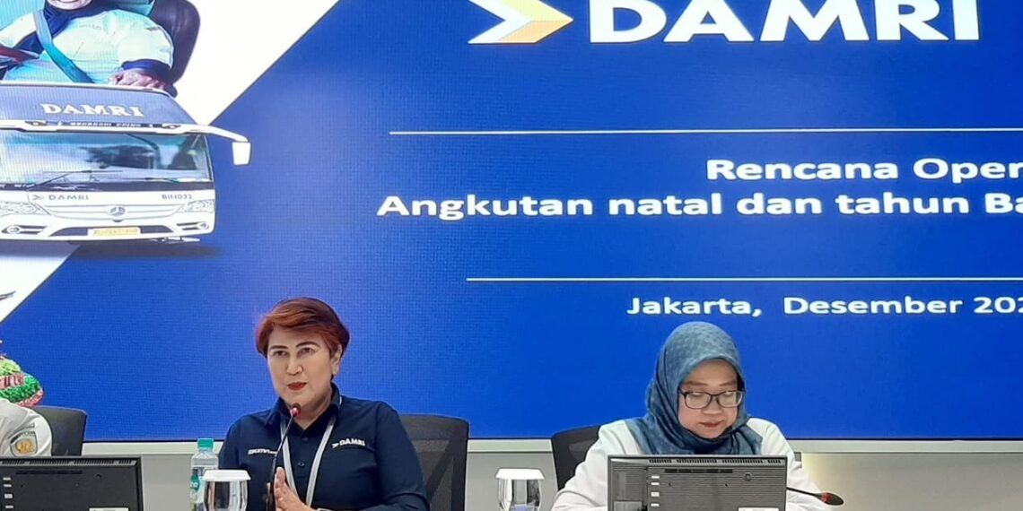 Setia N. Milatia Moemin, President Director of Perum Damri (left), at a press conference in the Ministry of SOEs, Central Jakarta (12/23). Credit: Sinta